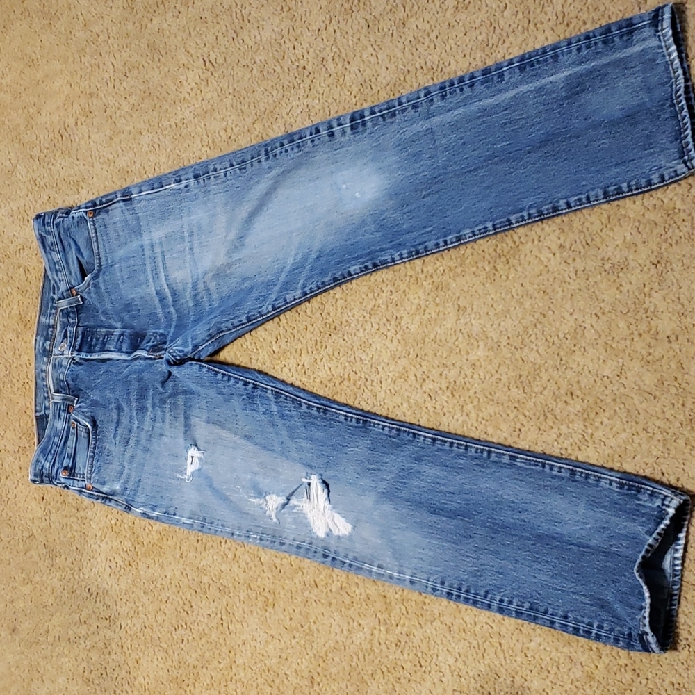 Levi's Men's Straight Jeans in Light Blue with Distressed Rips 501